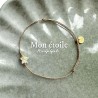 Bracelet breloque dans sa boule de Noël - Etoile cristal doré