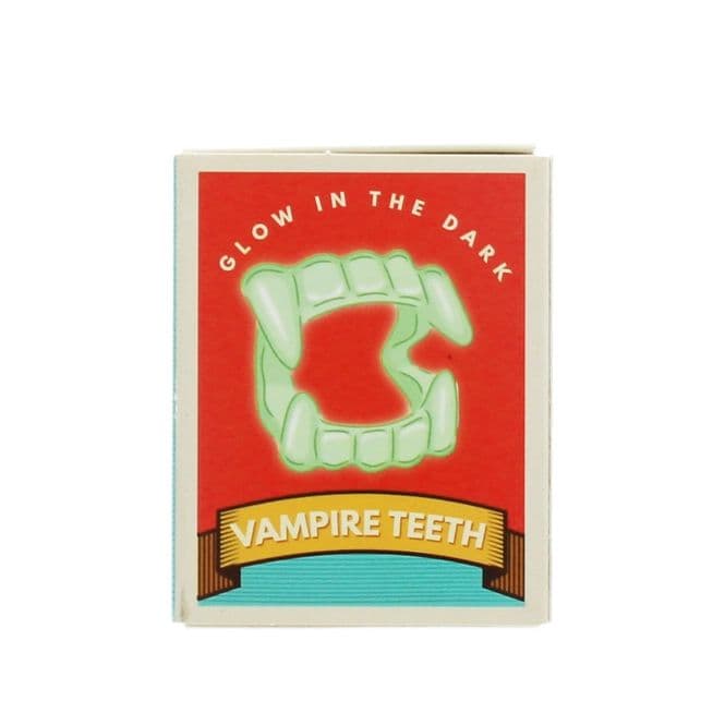 Dents de vampire phosphorescentes